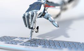 Robot typing on keyboard